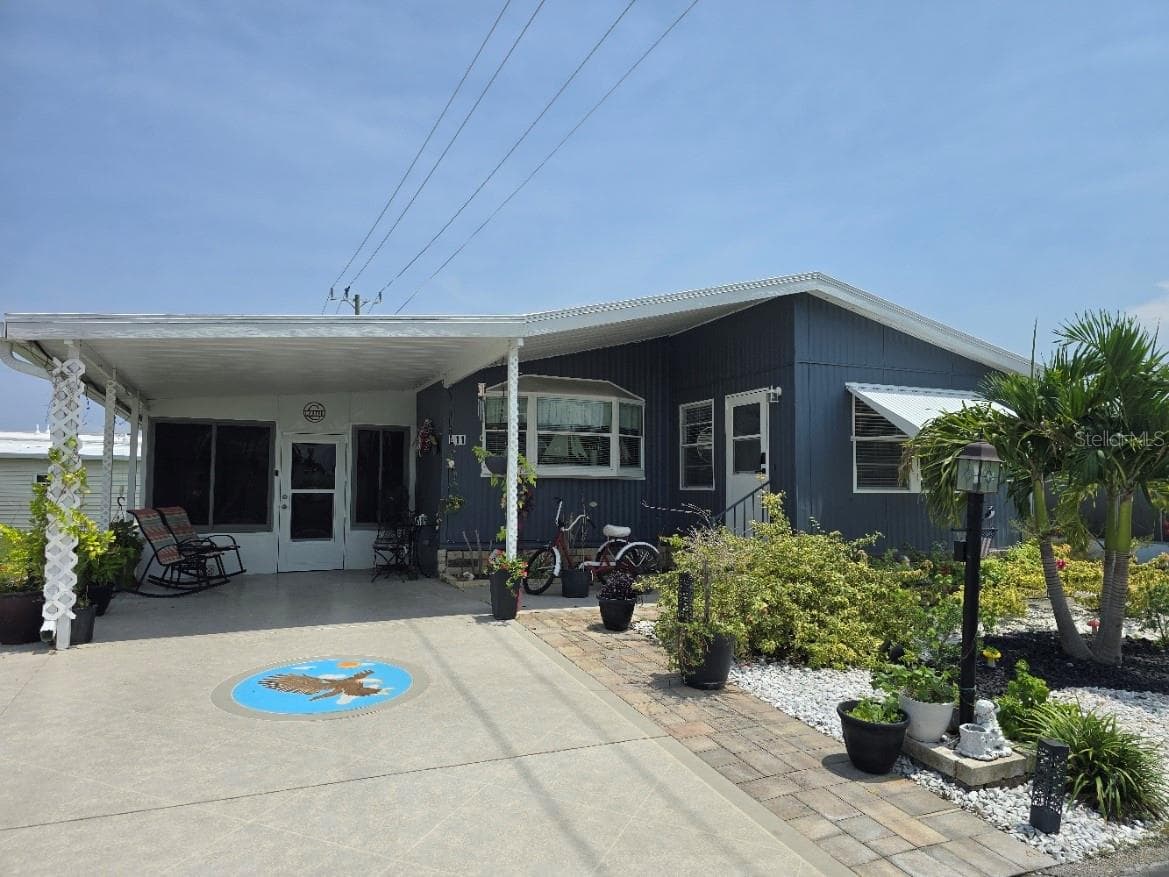 Manufactured Home at 5316 53RD AVE E #L11, BRADENTON, photo 4 of 46