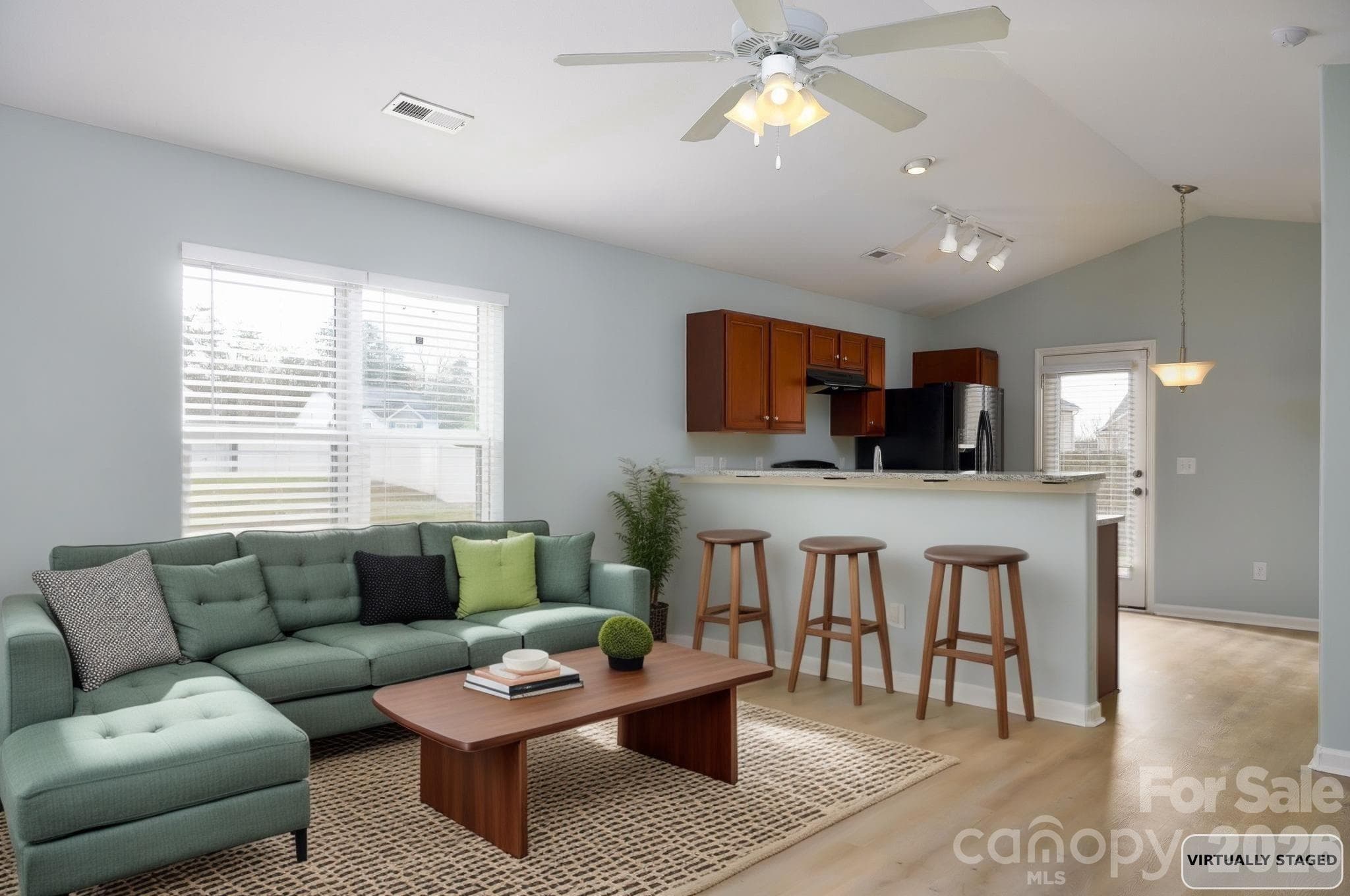 Virtually staged open concept living room - 1150 Red Sage Road, Winston Salem
