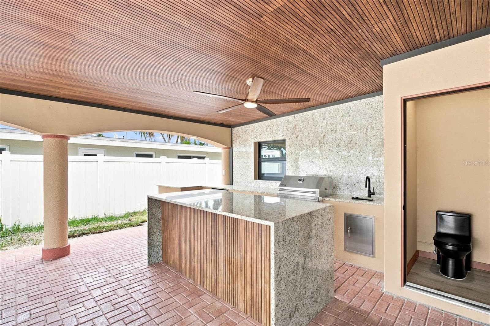 Outdoor kitchen with half bath - 15918 REDINGTON DR, REDINGTON BEACH