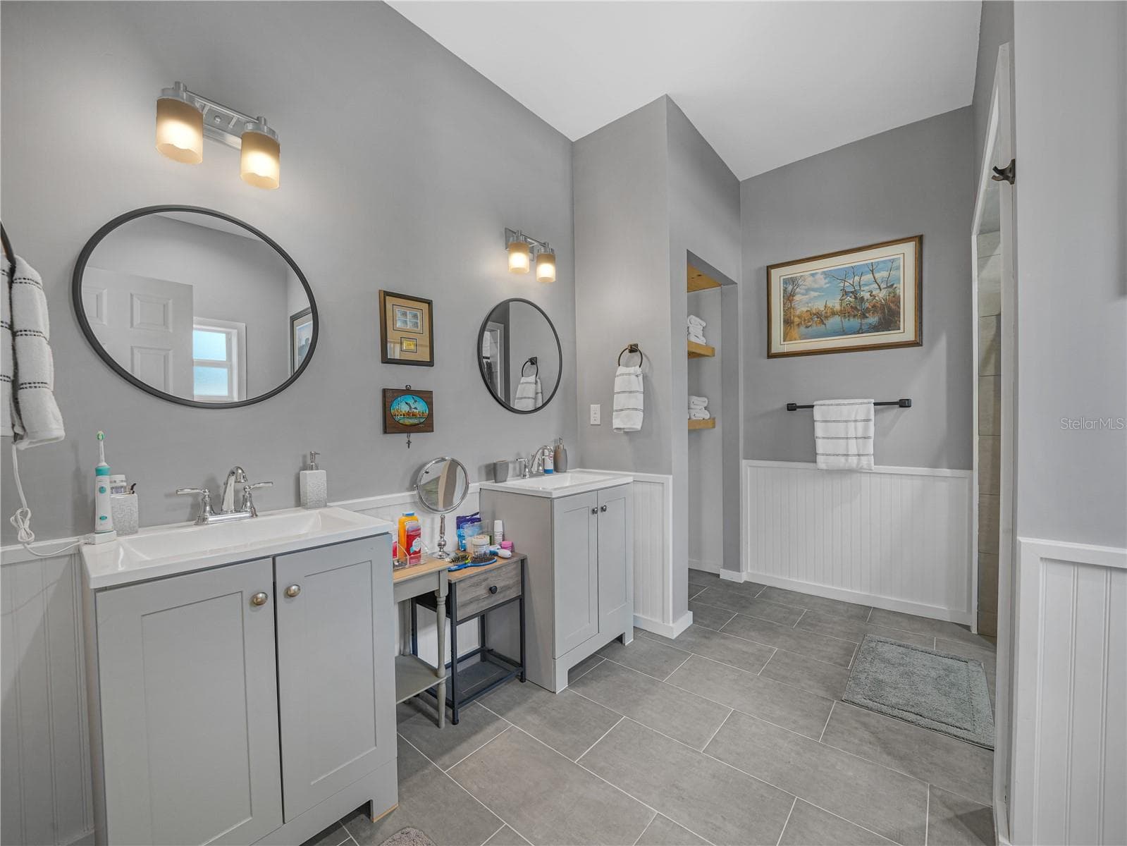 Primary bathroom with double vanities - 10134 S ORANGE BLOSSOM BLVD, SEBRING