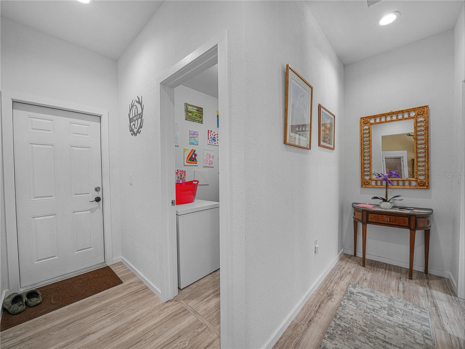 Garage door to indoor utility room - 10134 S ORANGE BLOSSOM BLVD, SEBRING