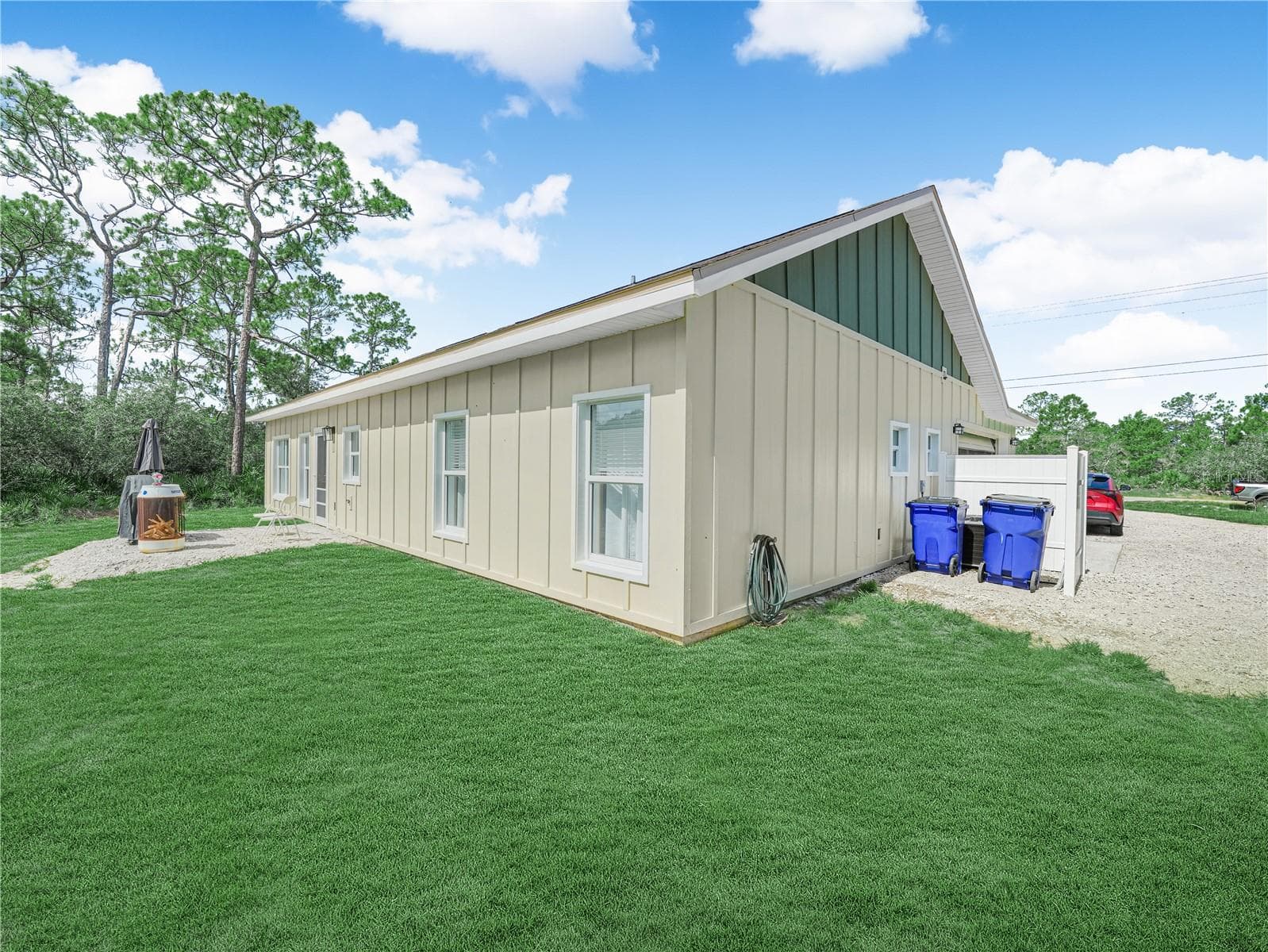 Side and back of home - 10134 S ORANGE BLOSSOM BLVD, SEBRING
