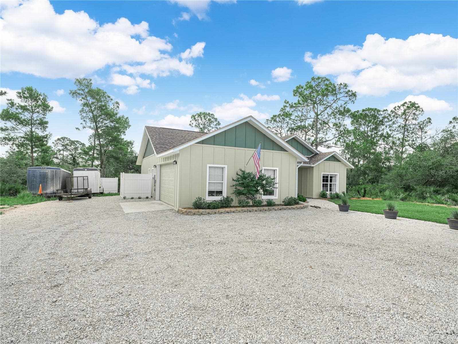 Front and side of home - 10134 S ORANGE BLOSSOM BLVD, SEBRING