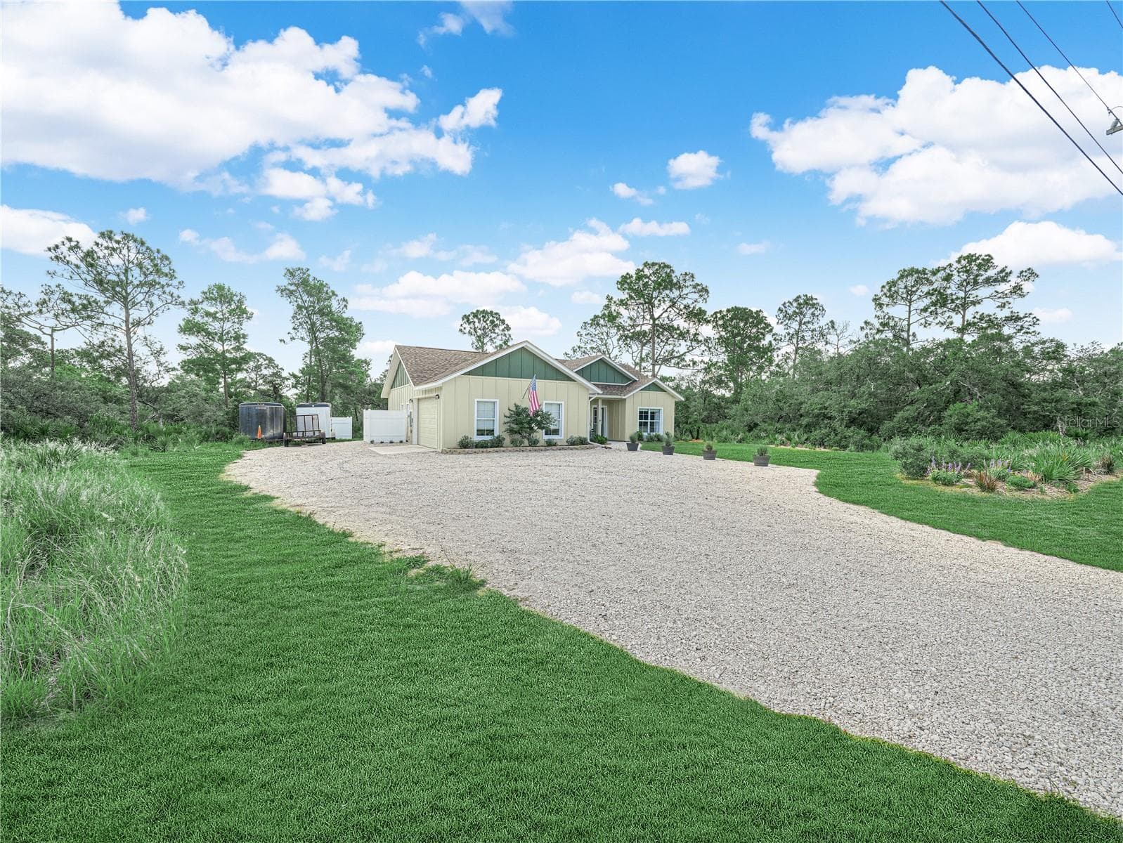 Front, side and long, oversized driveway - 10134 S ORANGE BLOSSOM BLVD, SEBRING