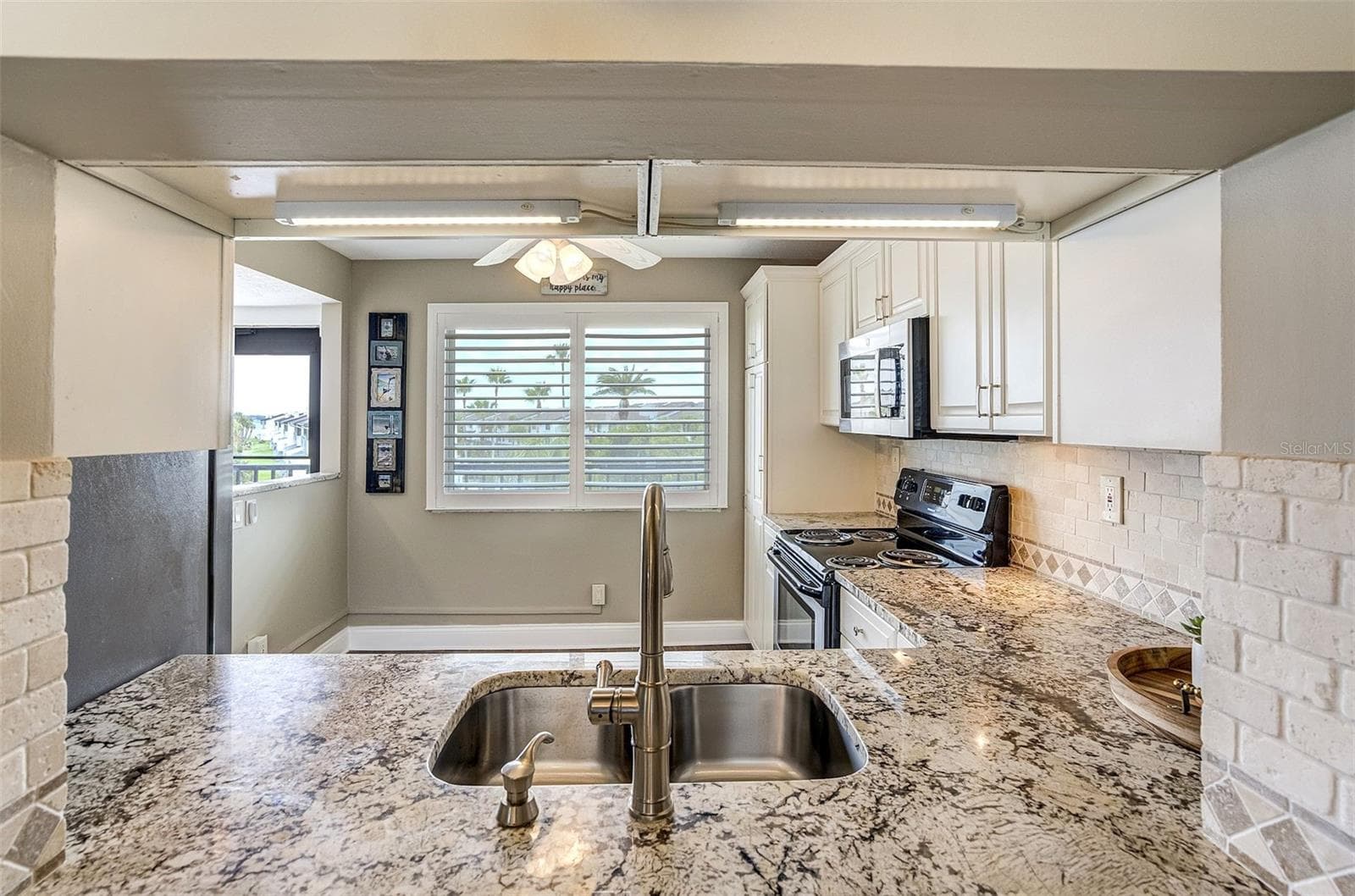 Natural Light Flowing In Kitchen - 1581 GULF BLVD #203N, CLEARWATER BEACH