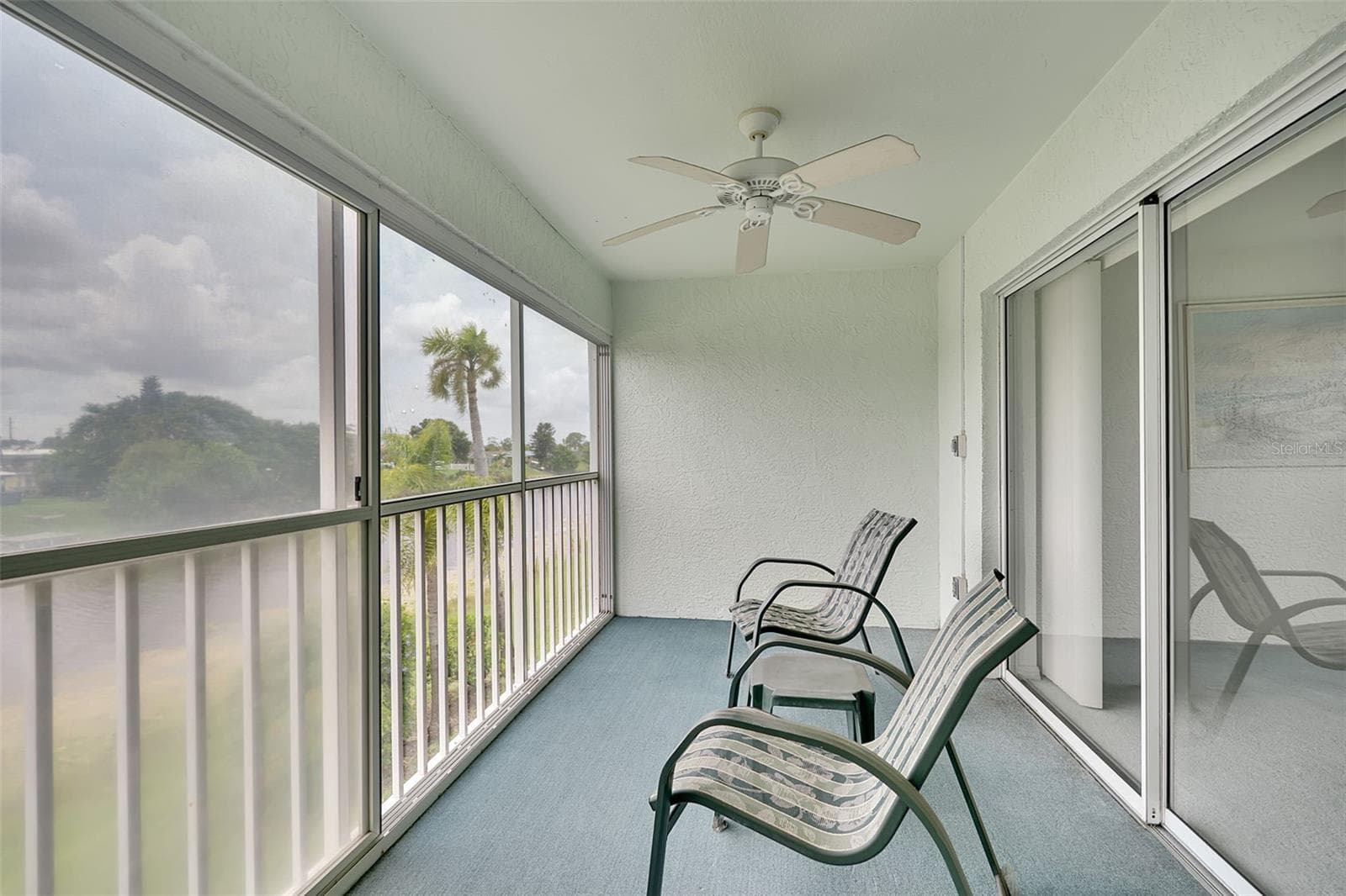 Private Lanai with Lake Views - 5725 GREENWOOD AVE #4201, NORTH PORT