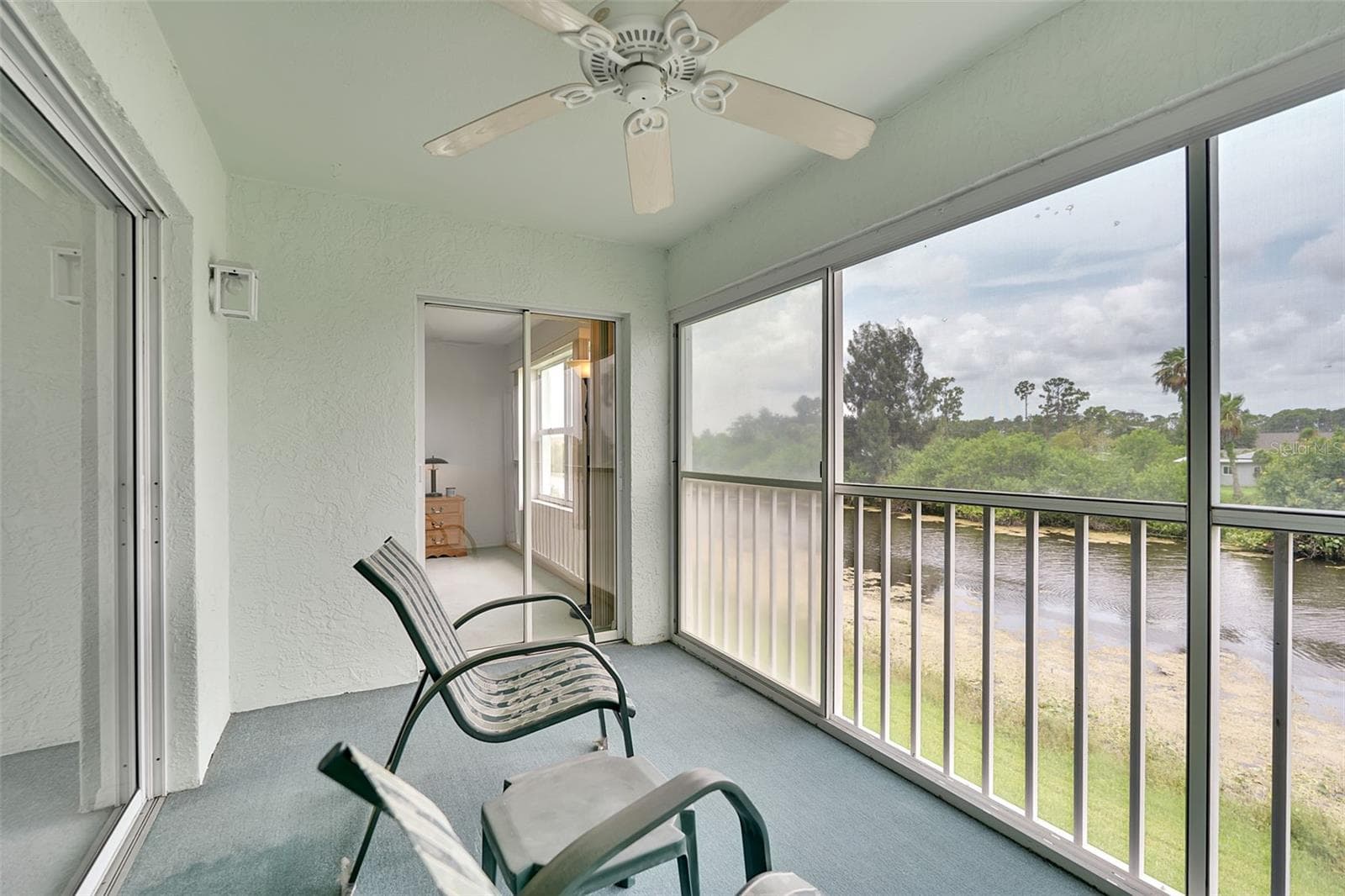 Private Lanai with Lake Views - 5725 GREENWOOD AVE #4201, NORTH PORT