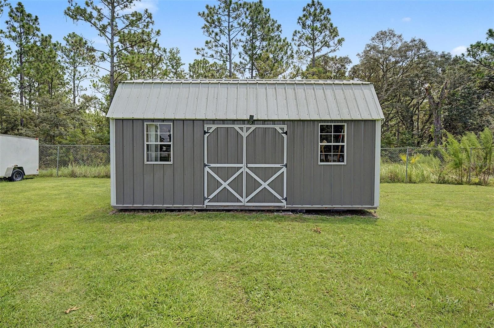 10x20 Shed in the back fenced in yard - 12258 HARRIS HAWK RD, WEEKI WACHEE