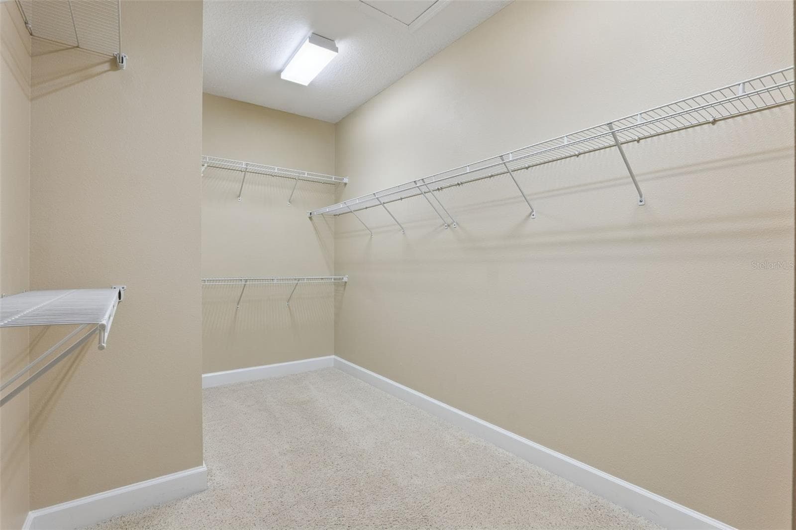 7'6" x 12'6" Primary Bedroom walk-in closet - 1381 ABBOT WAY, DELAND