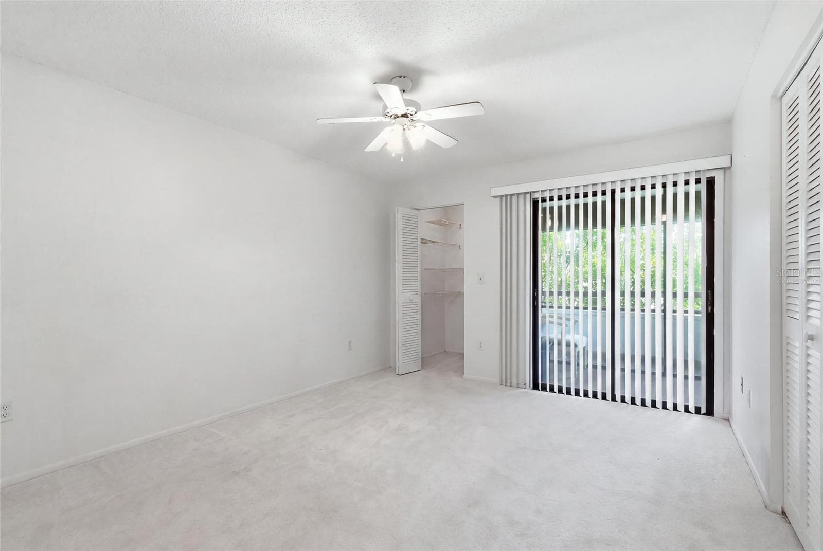 Virtually staged primary bedroom - 3500 EL CONQUISTADOR PKWY #332, BRADENTON