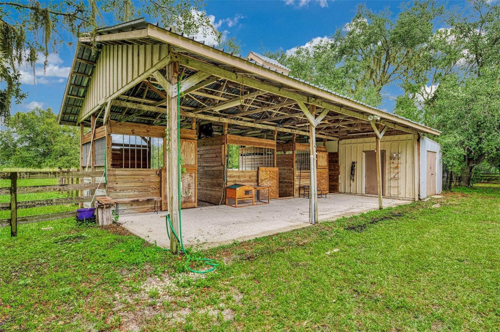 Barn with a tack and feed room plus extra storage nearby - 4610 403RD ST E, MYAKKA CITY