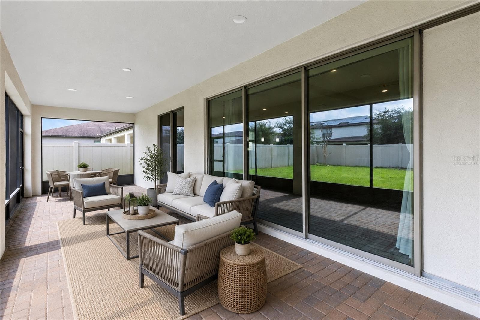 Virtually Staged Image. Screened lanai. - 2754 MATERA DR, ST CLOUD