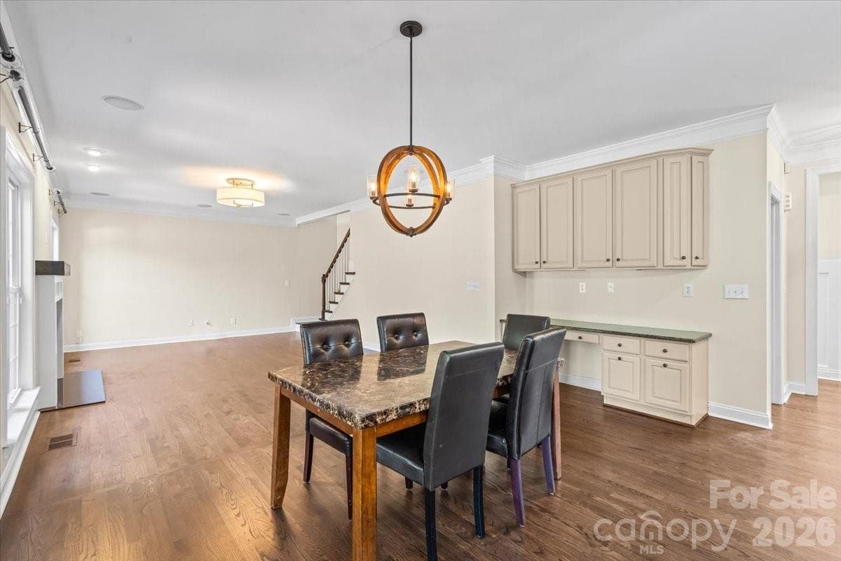 Breakfast area opens to living room - 109 Pauls Lane, Mooresville