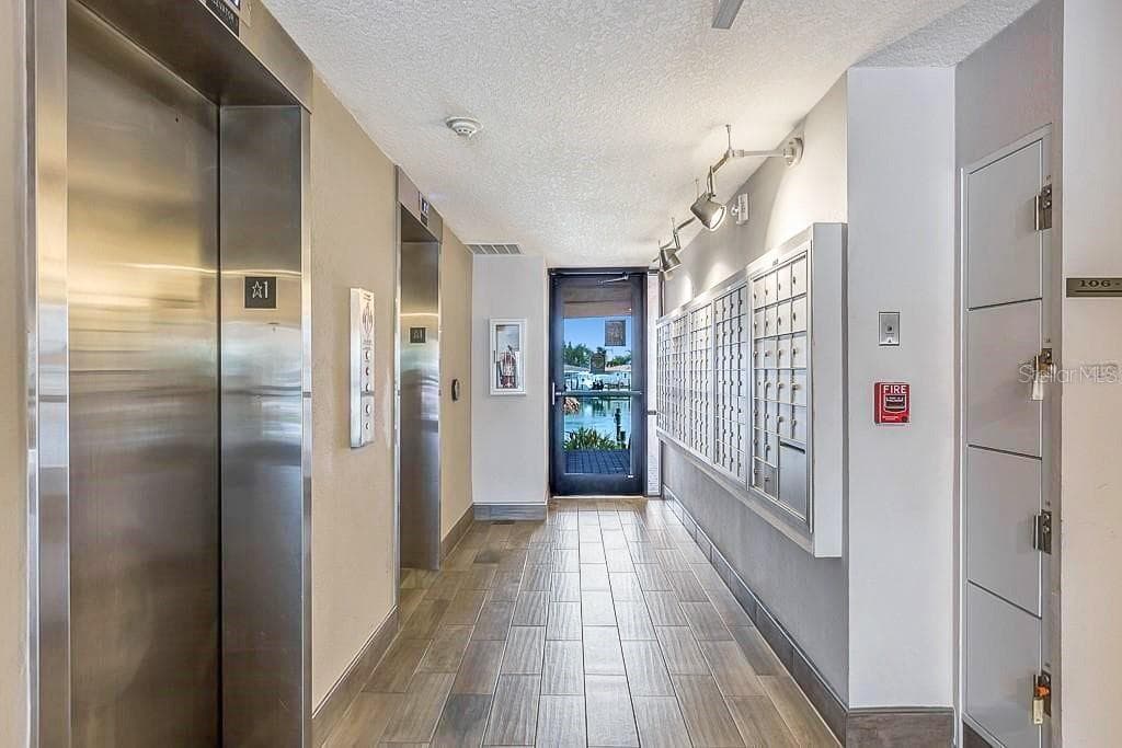 Updated and secured lobby. - 51 ISLAND WAY #311, CLEARWATER BEACH