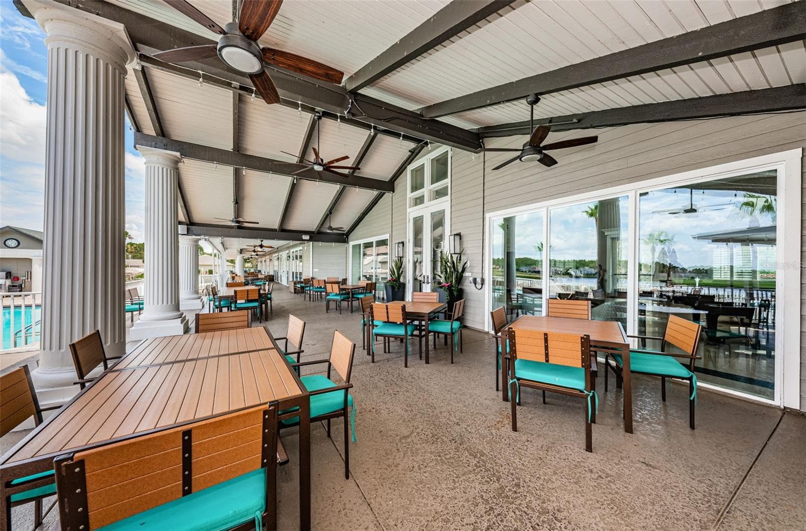 CLUBHOUSE PORCH ADJACENT TO THE RESTAURANT - 12021 FERN TERRACE CT, TRINITY