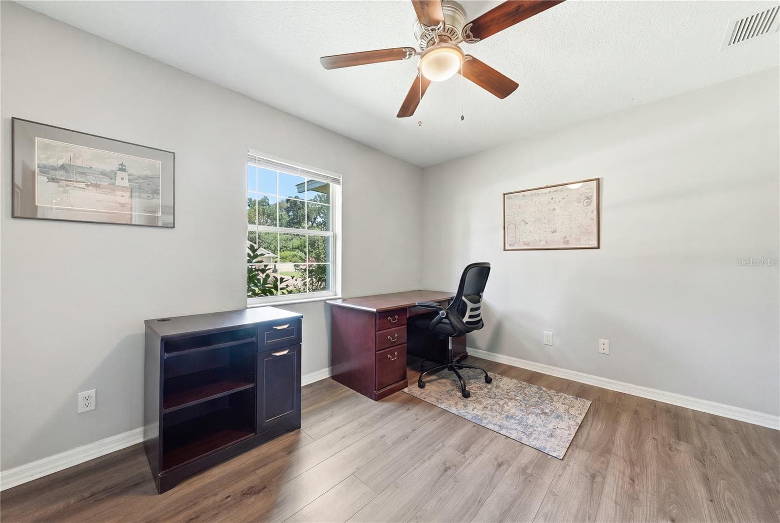Guest bedroom used as an office with a view - 3835 NE 13TH AVE, OCALA