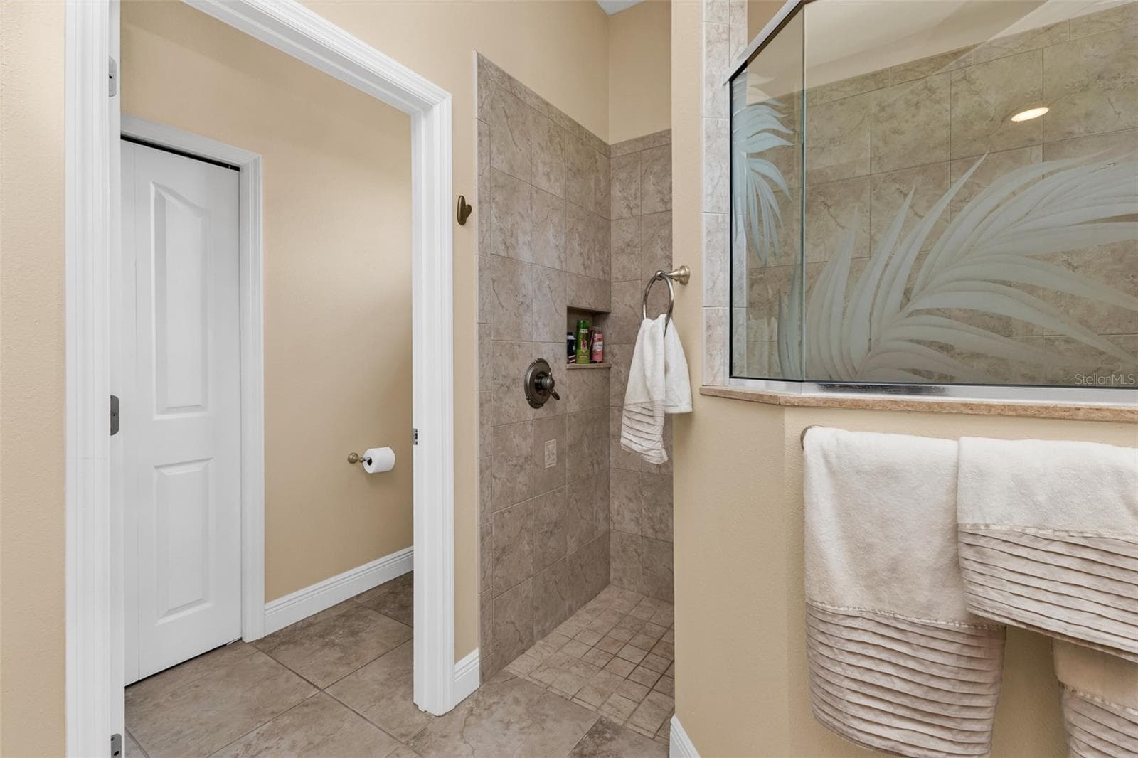 Master Bath, huge walk-in shower, water closet and linen closet shown - 24228 PEPPERCORN RD, PUNTA GORDA