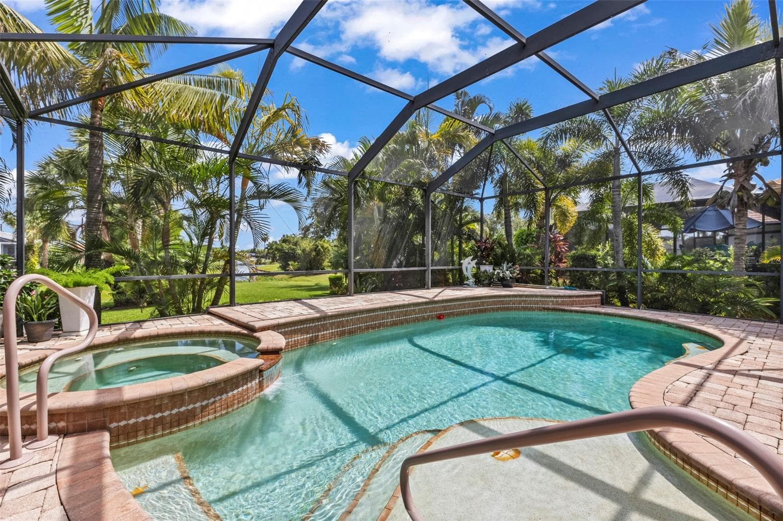 Tropical setting adds privacy and shady spots - 24228 PEPPERCORN RD, PUNTA GORDA