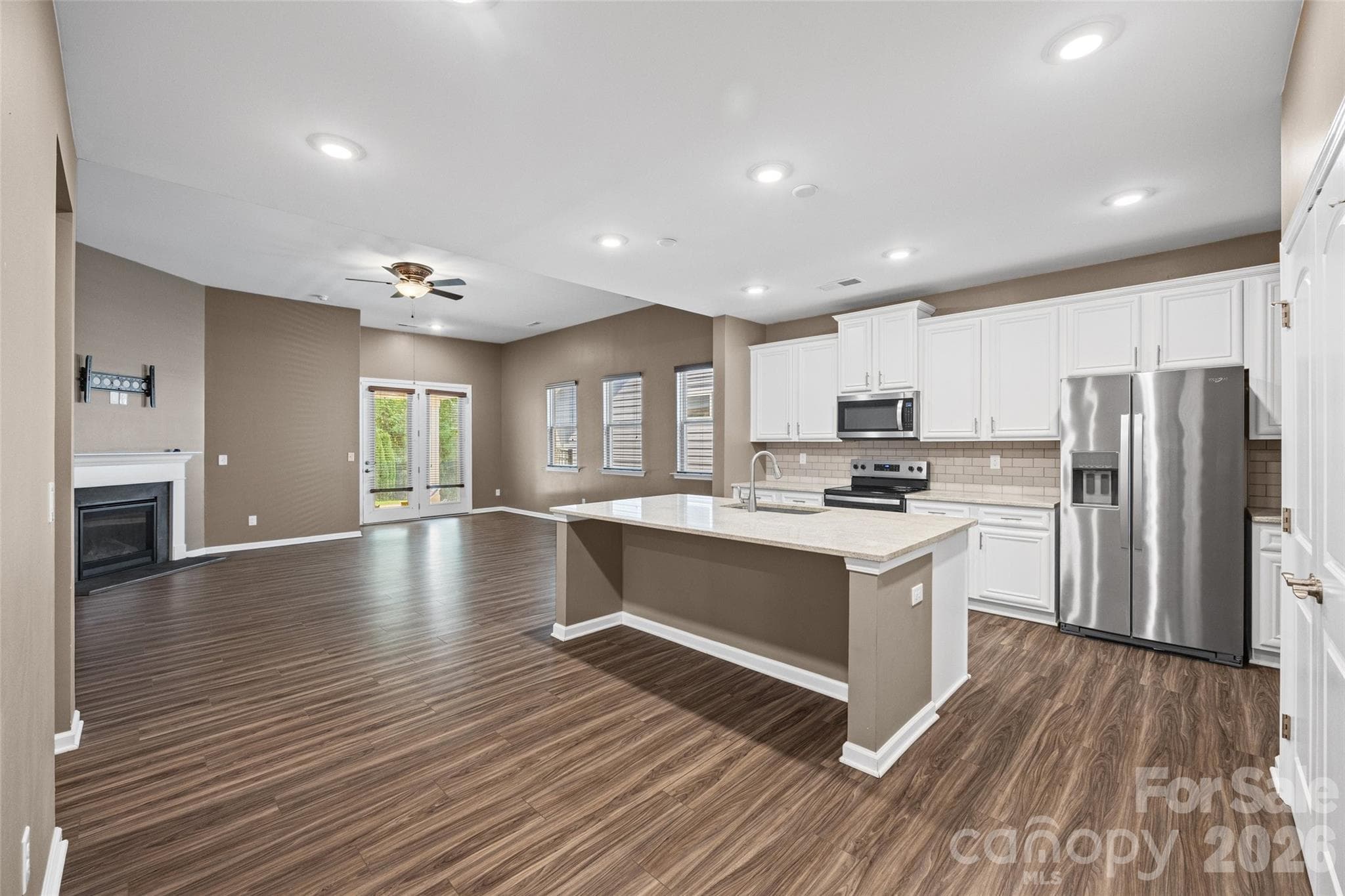Open-concept kitchen and living space designed for easy everyday living, family gatherings, and effortless entertaining. - 596 Rustlewood Way, Rock Hill