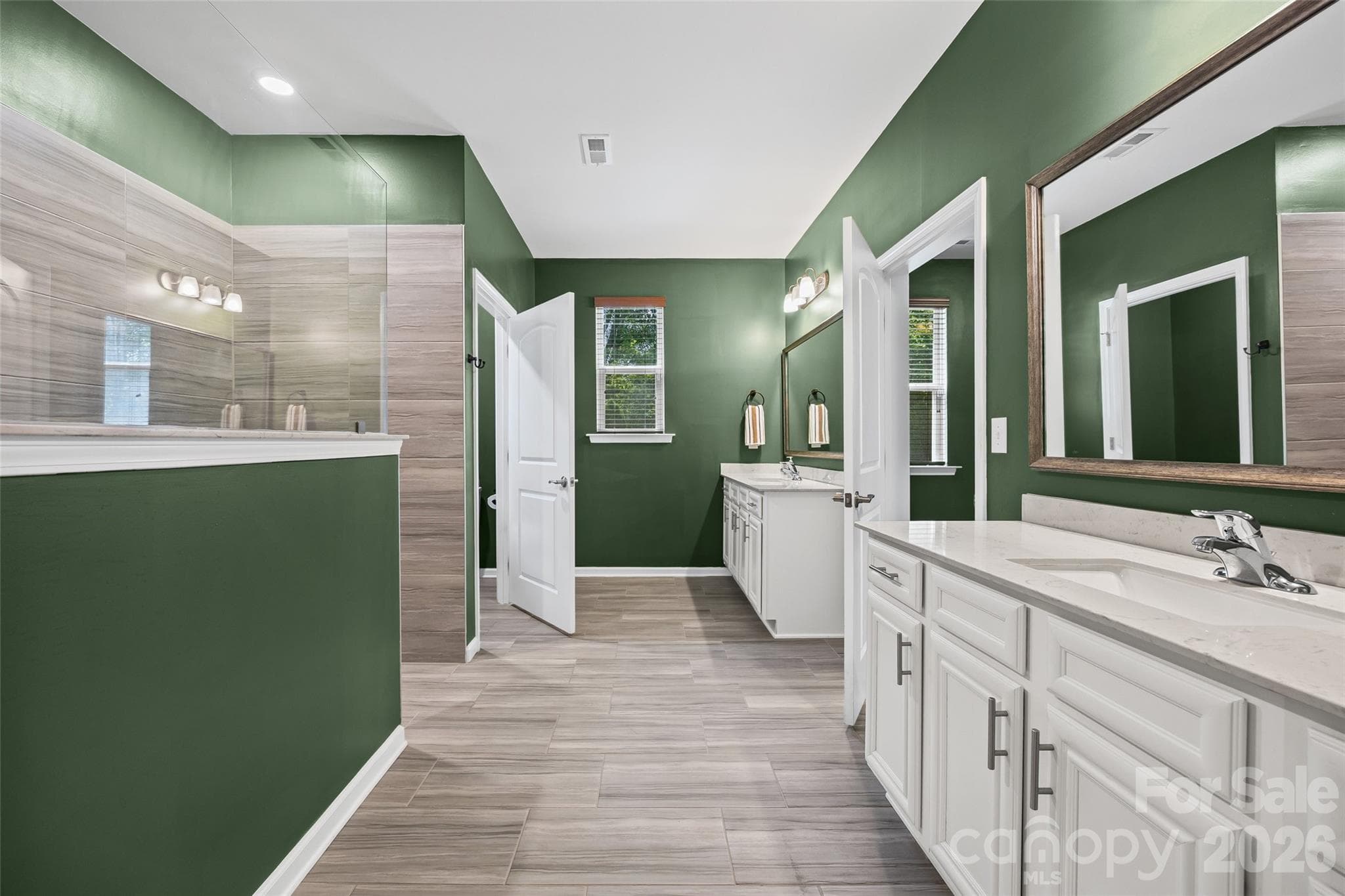 Spacious dual vanity area gives everyone their own space to get ready, with plenty of room for personal essentials without getting in each other’s way. - 596 Rustlewood Way, Rock Hill