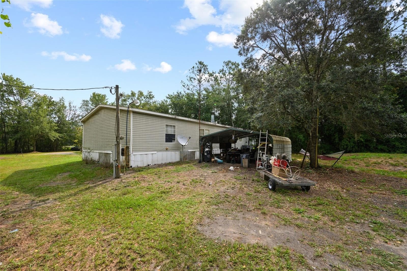 Manufactured Home at 9798 STATE ROAD 100 W, STARKE, photo 39 of 46