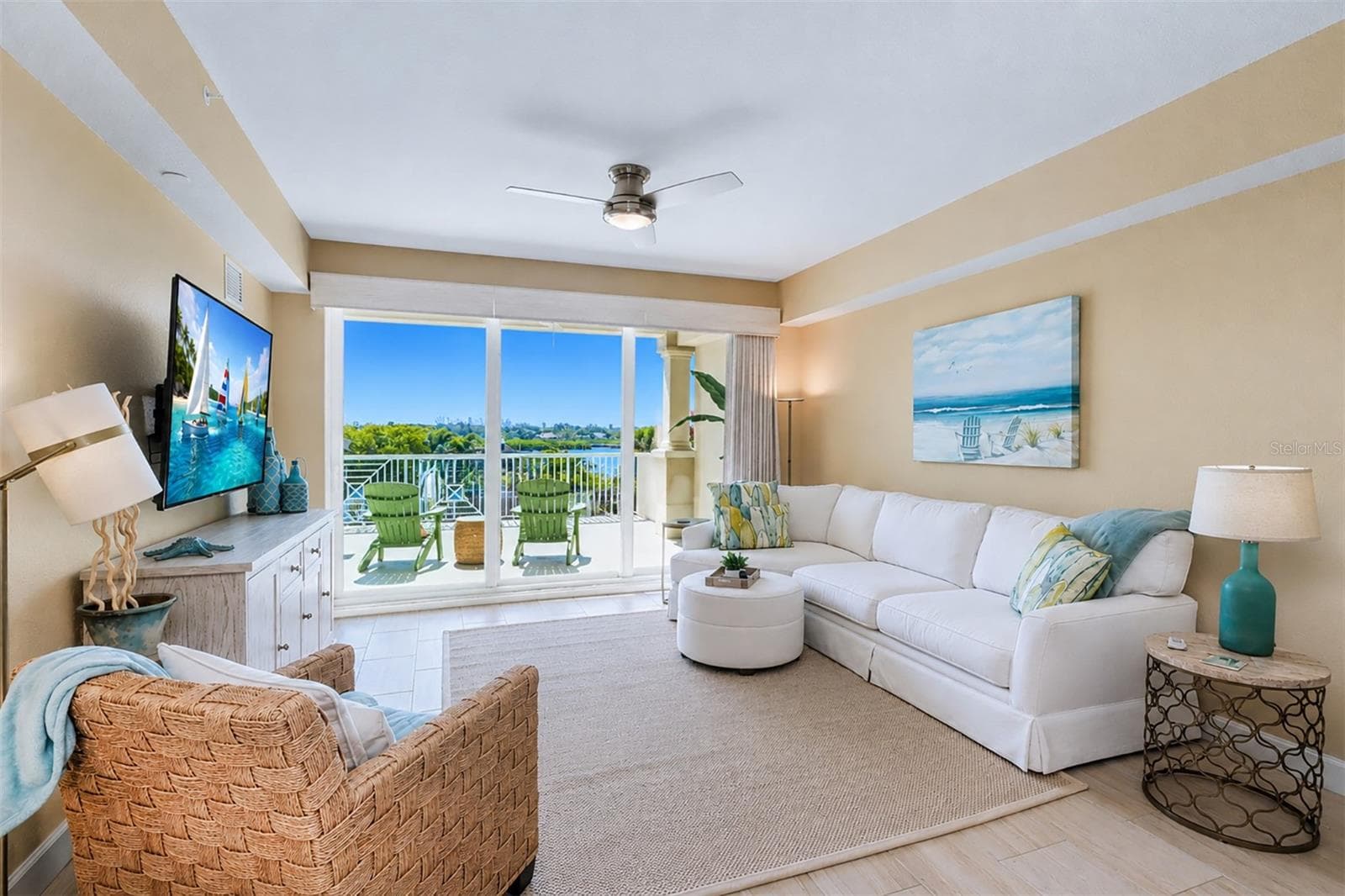.. 14.6 X 18 Liivng Room with Coffered Ceilings - Plus High Impact Triple Sliders that Recess to a 8 Foot Opening if needed - Custom 2 way Floor to Ceiling Woven Wood Drapes. New Fan.. - 19519 GULF BLVD #202, INDIAN SHORES