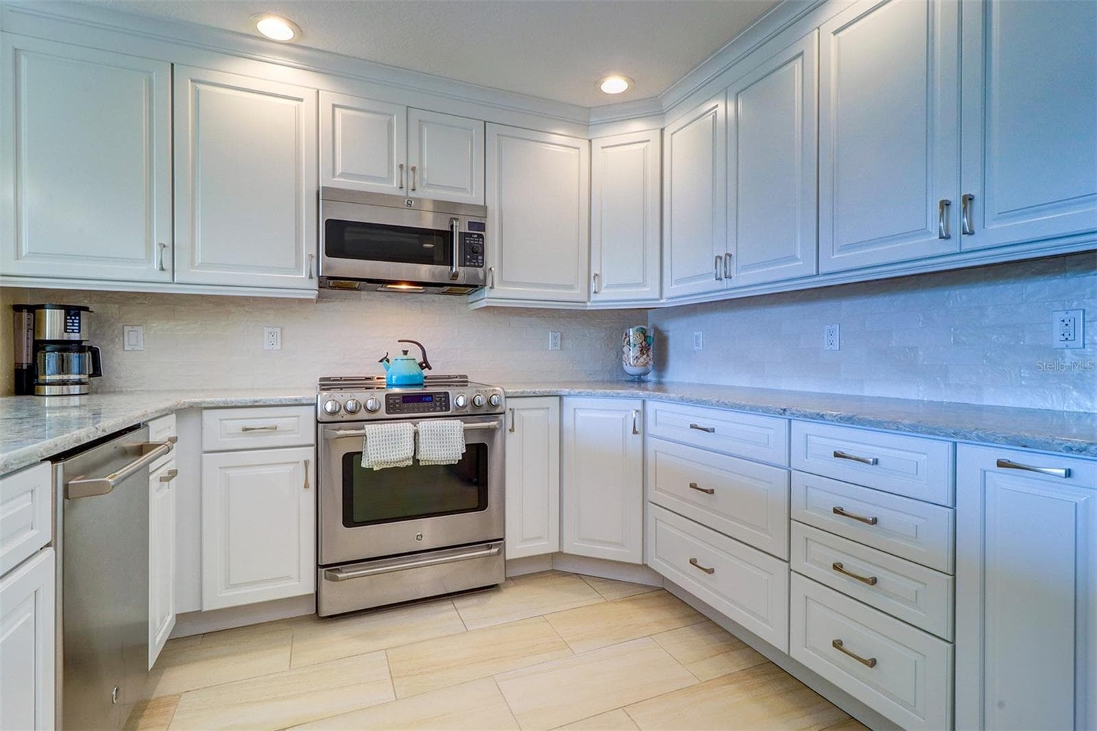 ..REMODELED KITCHEN #3.. Under Counter Lighting - Soft Close Hardware - GE Cafe Appliances - - 19519 GULF BLVD #202, INDIAN SHORES