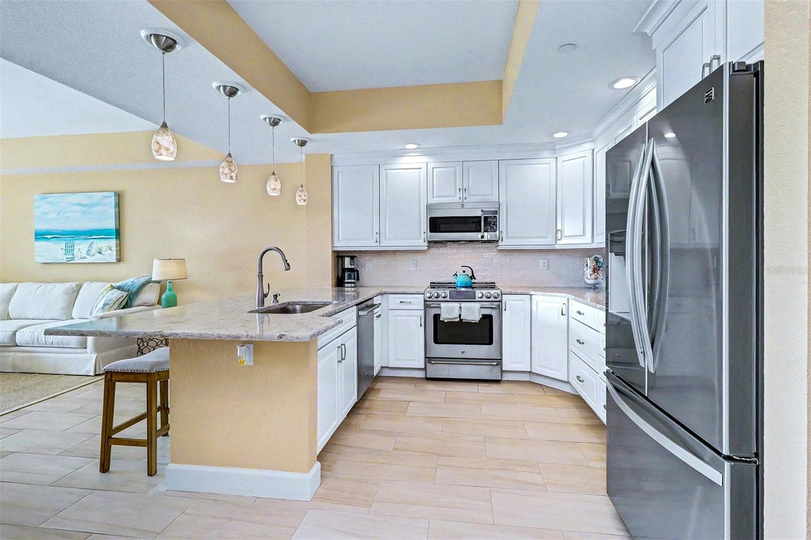 ... SPACIOUS 11.5 x 10' KITCHEN SHOT #4.. Oversized Quartz Countertops - KreftMaid Cabinetry - High Ceiling. - 19519 GULF BLVD #202, INDIAN SHORES