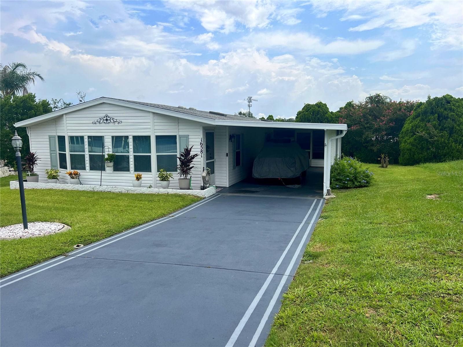 Manufactured Home at 16581 SE 96TH AVE, SUMMERFIELD, photo 2 of 24