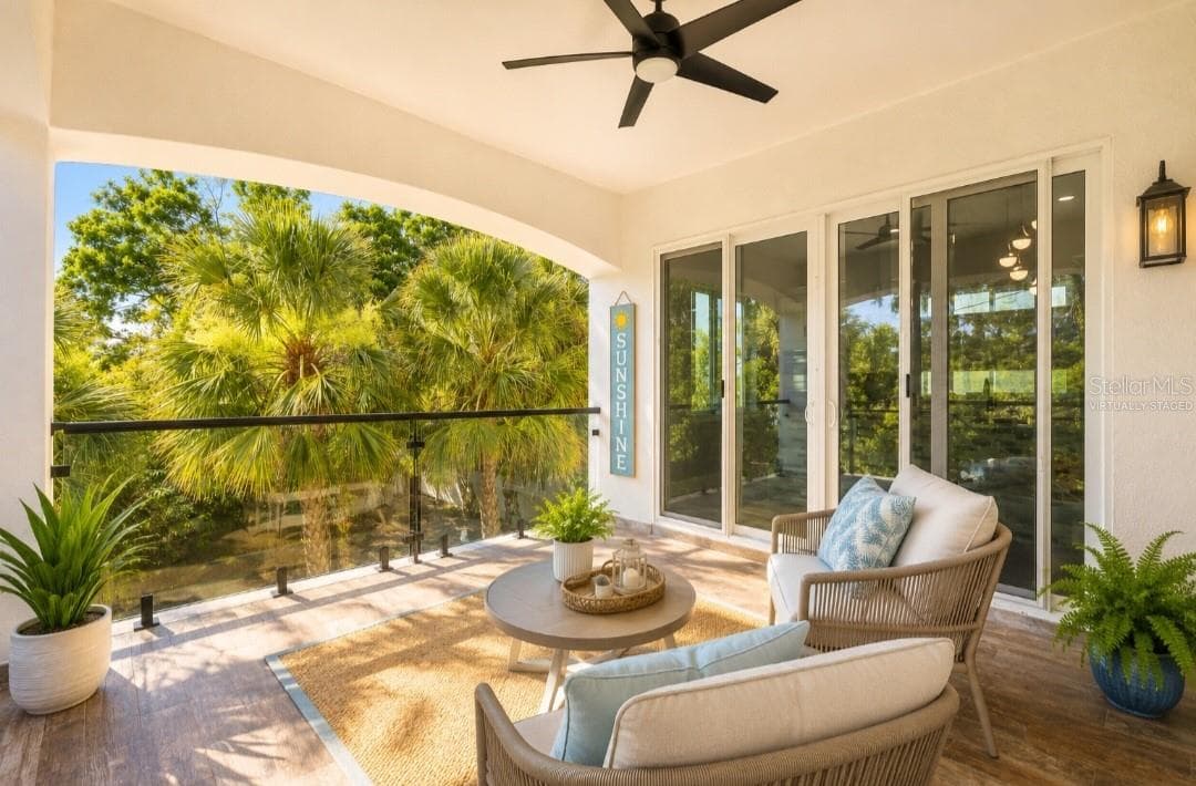 Virtually staged Porch , veranda second floor - 1956 CEDAR DR, DUNEDIN