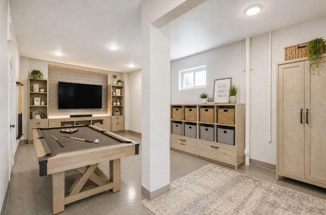 Virtually staged , Entertainment area, storage in the garage - 1956 CEDAR DR, DUNEDIN