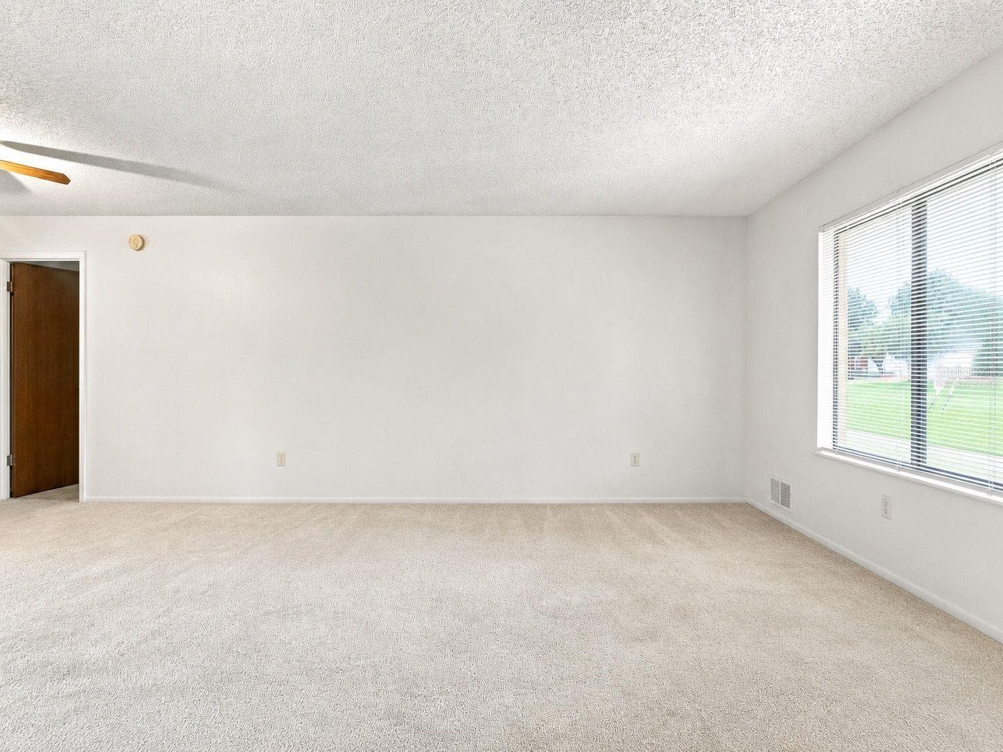 Virtually staged Master bedroom - 1418 CATALINA BLVD, DELTONA