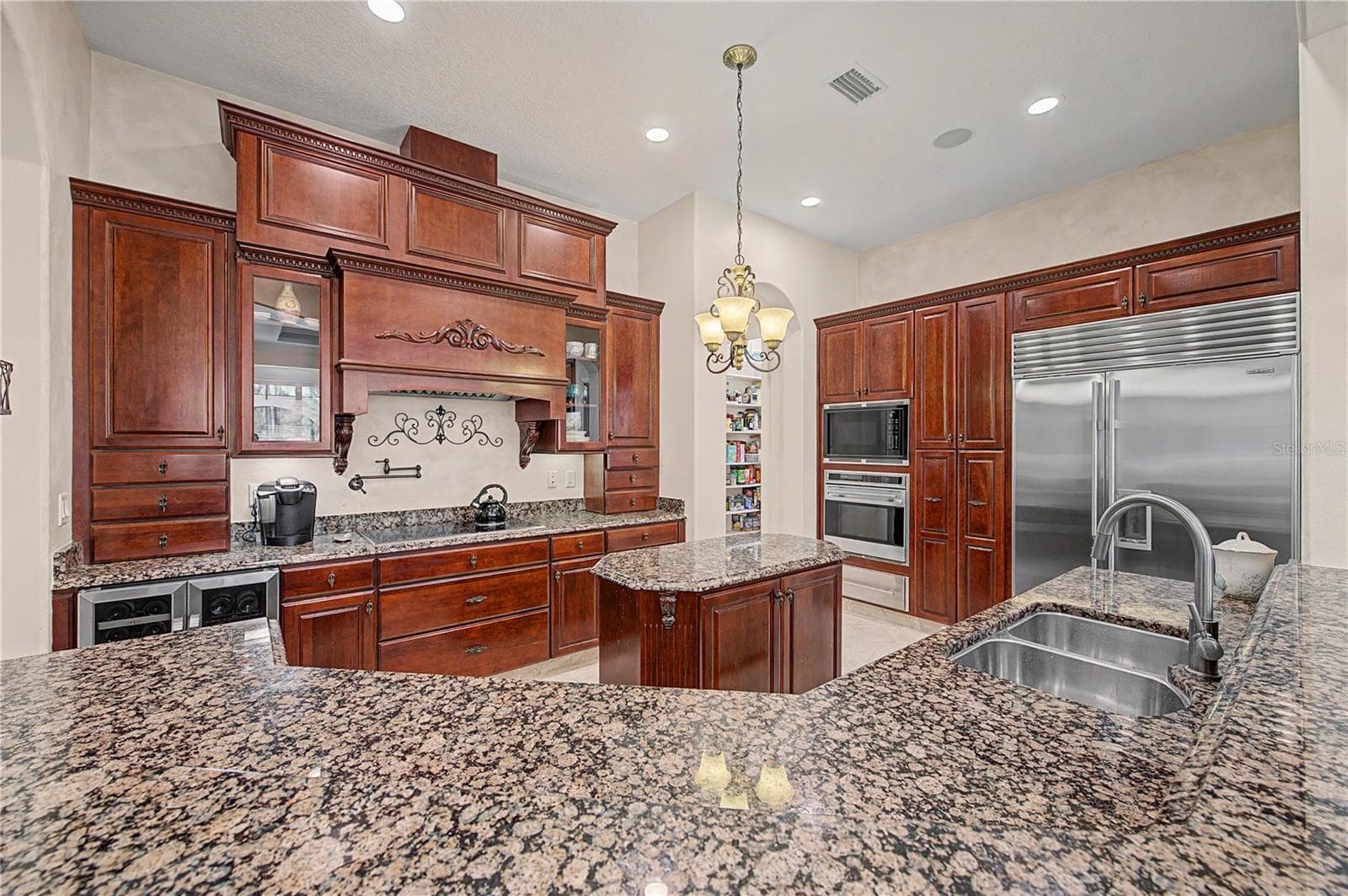 Breakfast Bar with view of gourmet kitchen - 21246 QUIET HAVEN CT, LAND O LAKES