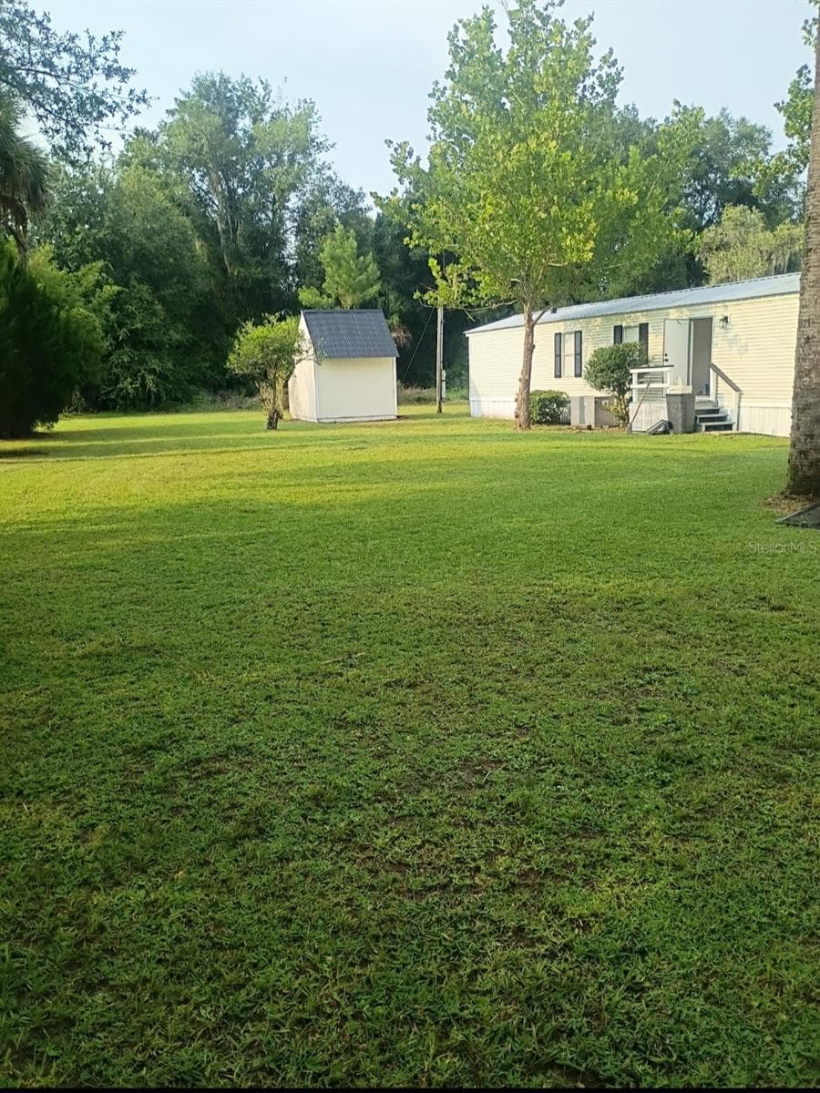 Manufactured Home at 105 CANARY LANE, SATSUMA, photo 4 of 32