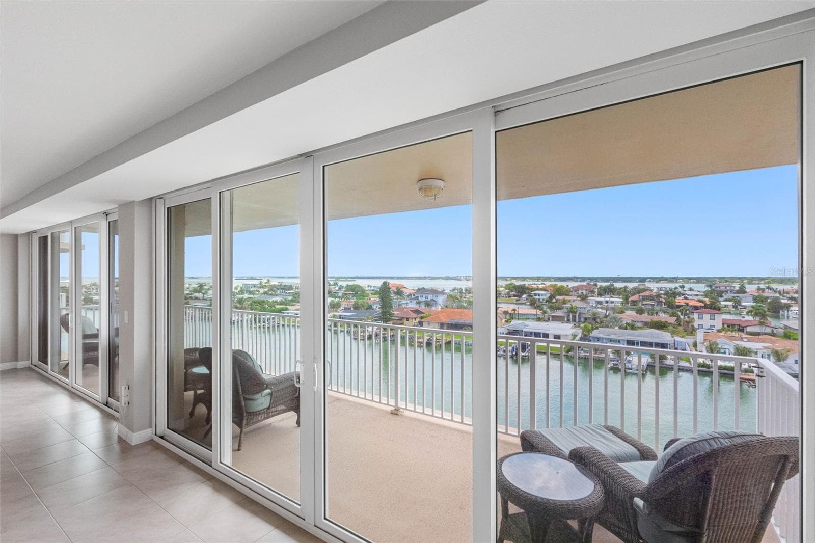34 Feet of Impact Glass Sliding Doors - 223 ISLAND WAY #7F, CLEARWATER BEACH