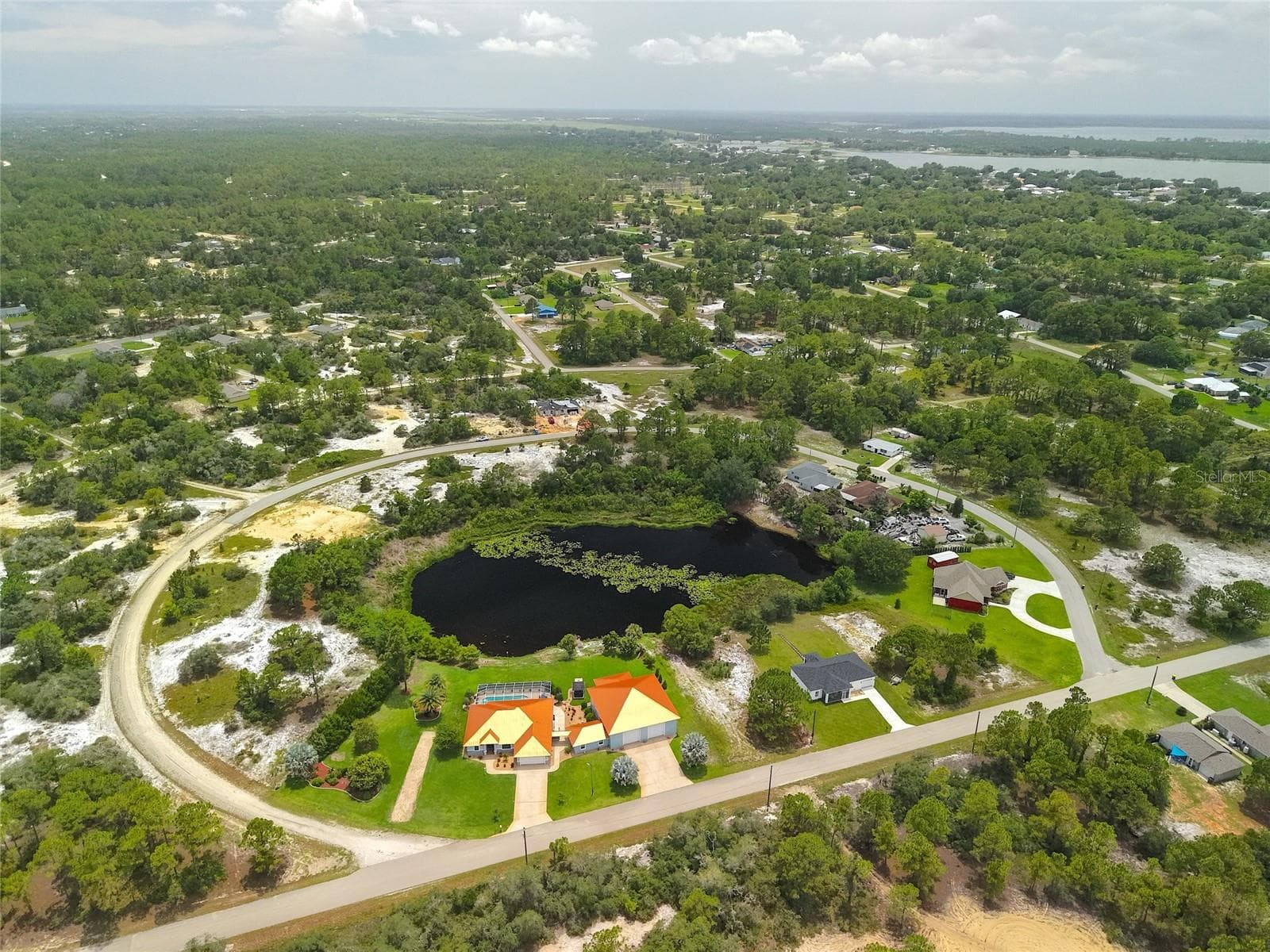 See Lake Grassy in the background. - 659 LAKE TINA DR, LAKE PLACID