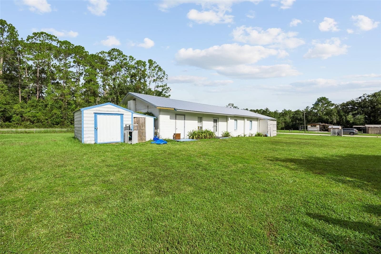 2 exit doors -1 in 1st classroom and in fellowship hall and 2 storage buildings - 101 SESAME ST, PALATKA