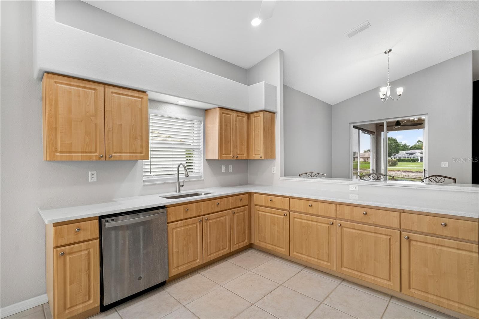 KITCHEN/ STAINLESS STEEL APPLIANCES/ QUARTZ COUNTERS - 9257 BONNIE COVE DR, WEEKI WACHEE