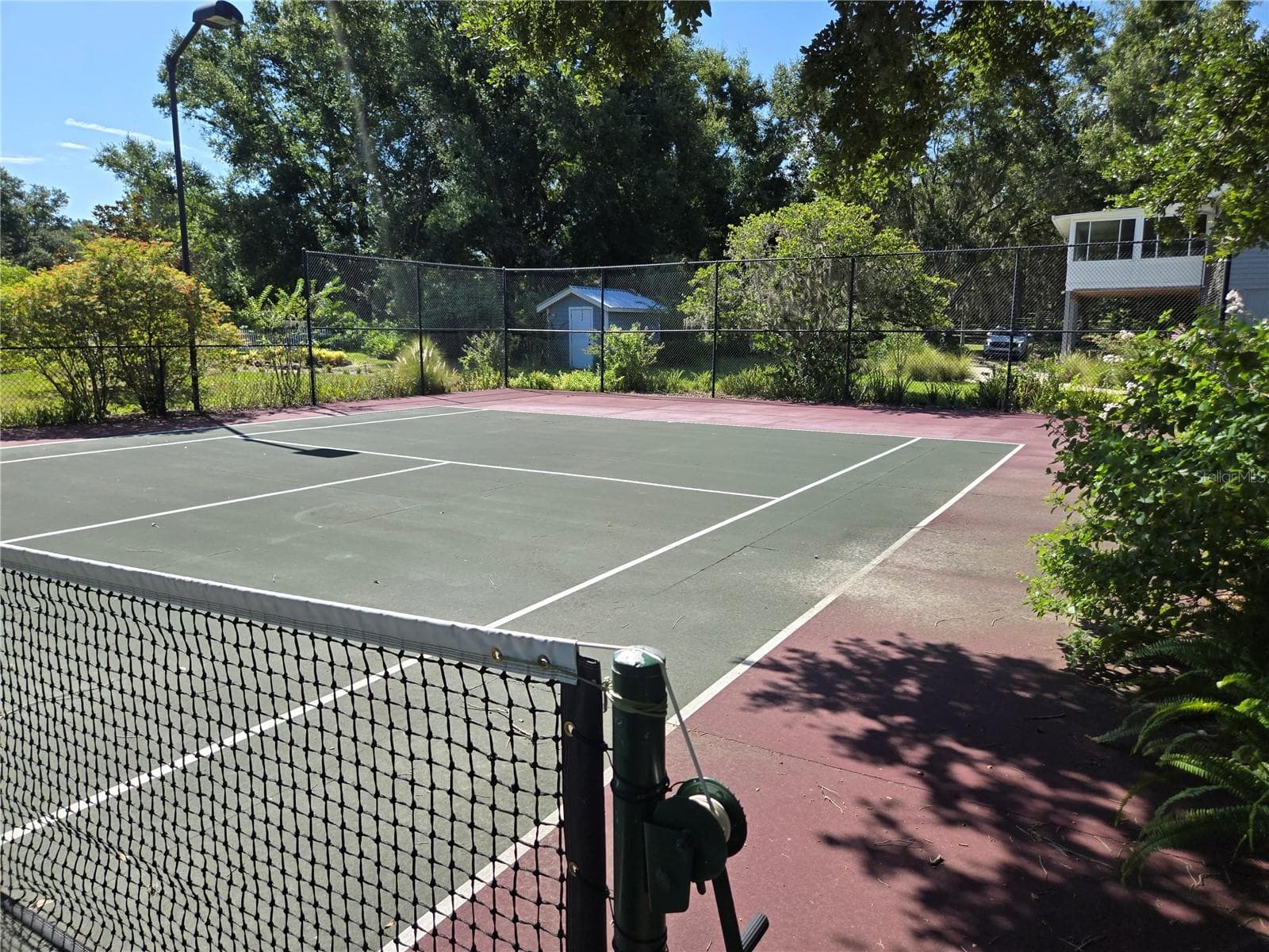 Tennis Court view toward House - 18249 ROSE ST, GROVELAND