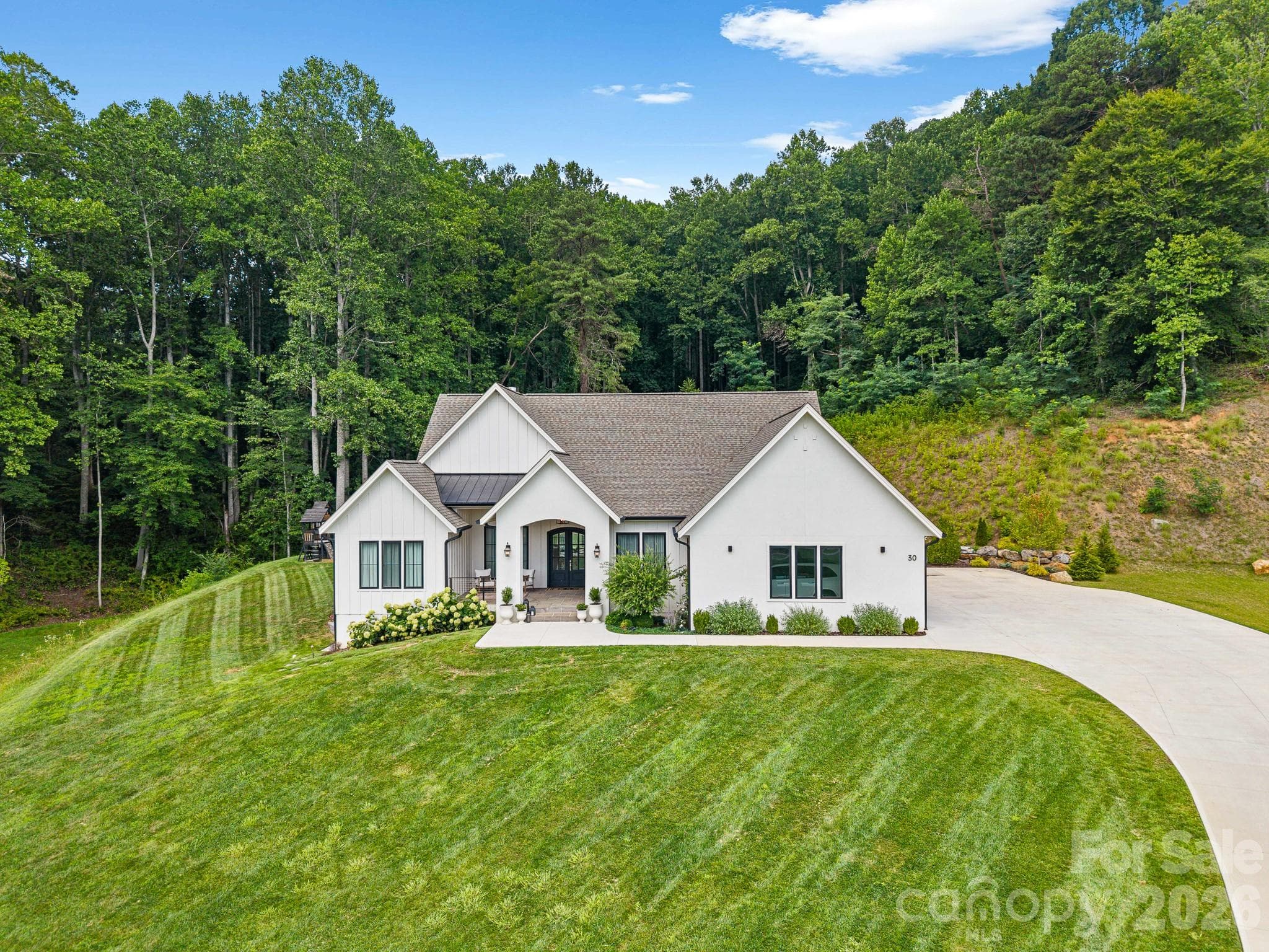 Single Family Residence at 30 Bridgeway Drive, Candler, photo 5 of 46