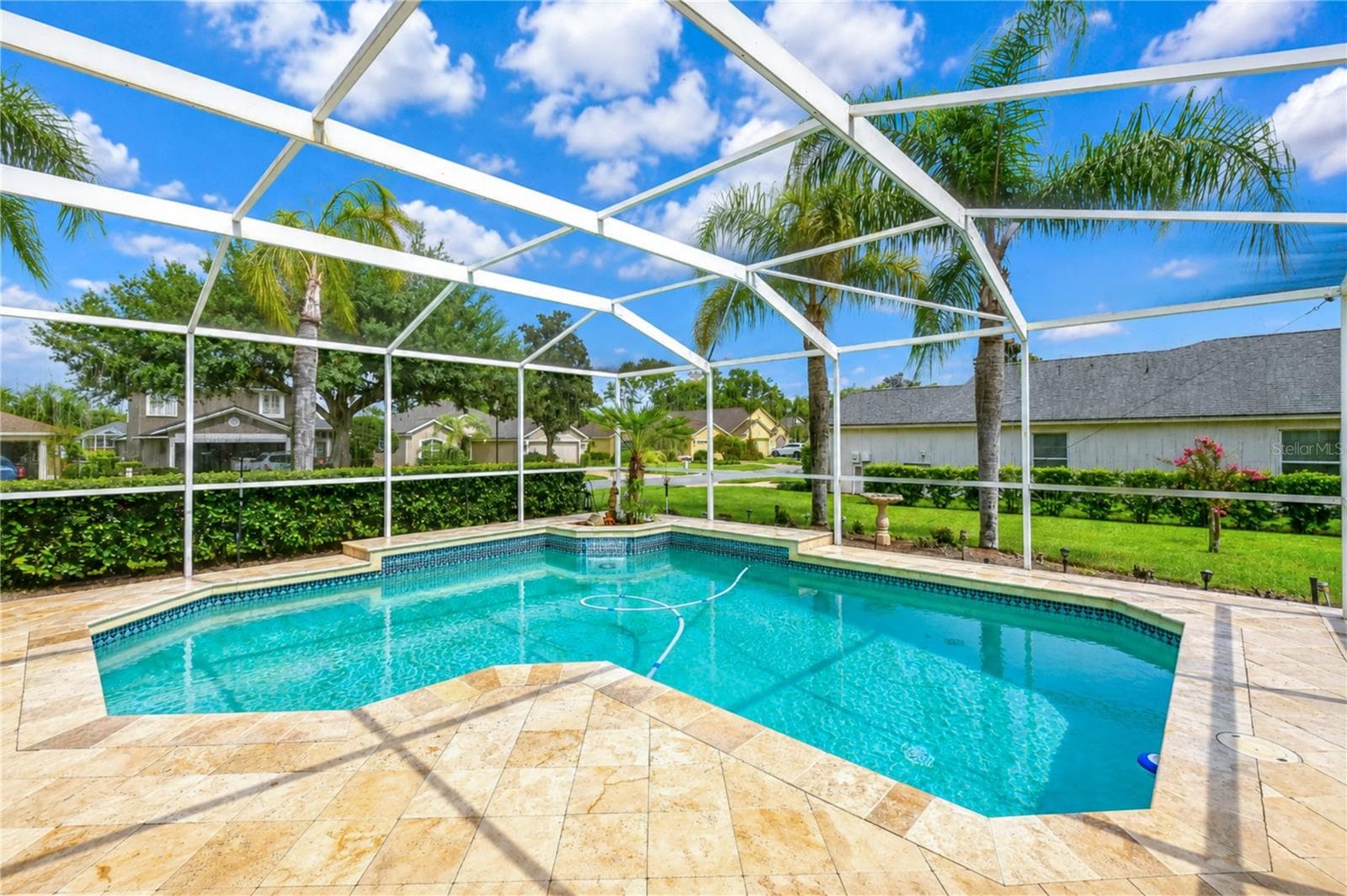 Sparkling private pool creates the perfect setting for cooling off and enjoying Florida's year-round lifestyle. - 5602 ROCKFIELD LOOP, VALRICO
