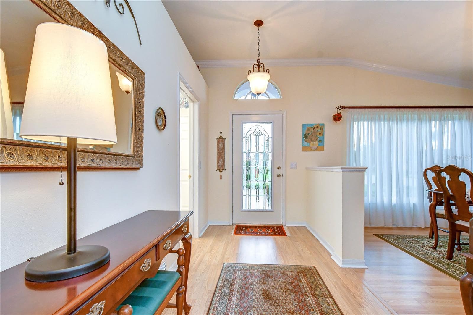 Welcoming entry opens to bright and inviting living spaces filled with natural light. - 5602 ROCKFIELD LOOP, VALRICO
