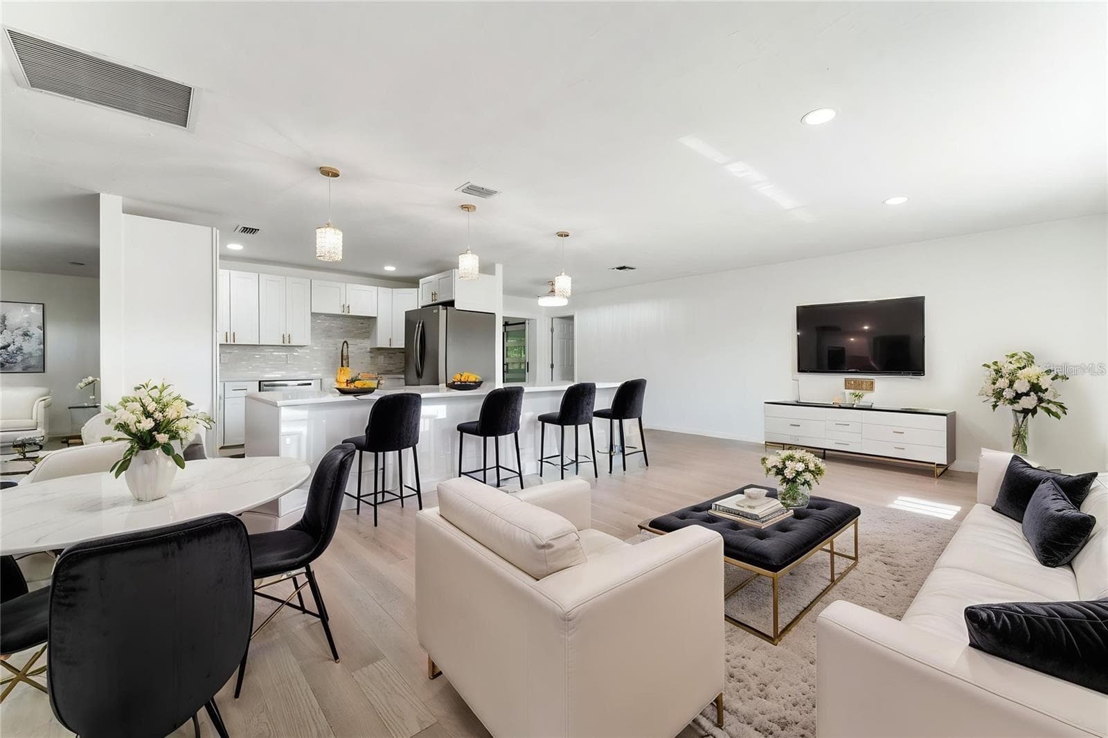 Staged LIVING / DINING - 1231 BEACON DR, PORT CHARLOTTE