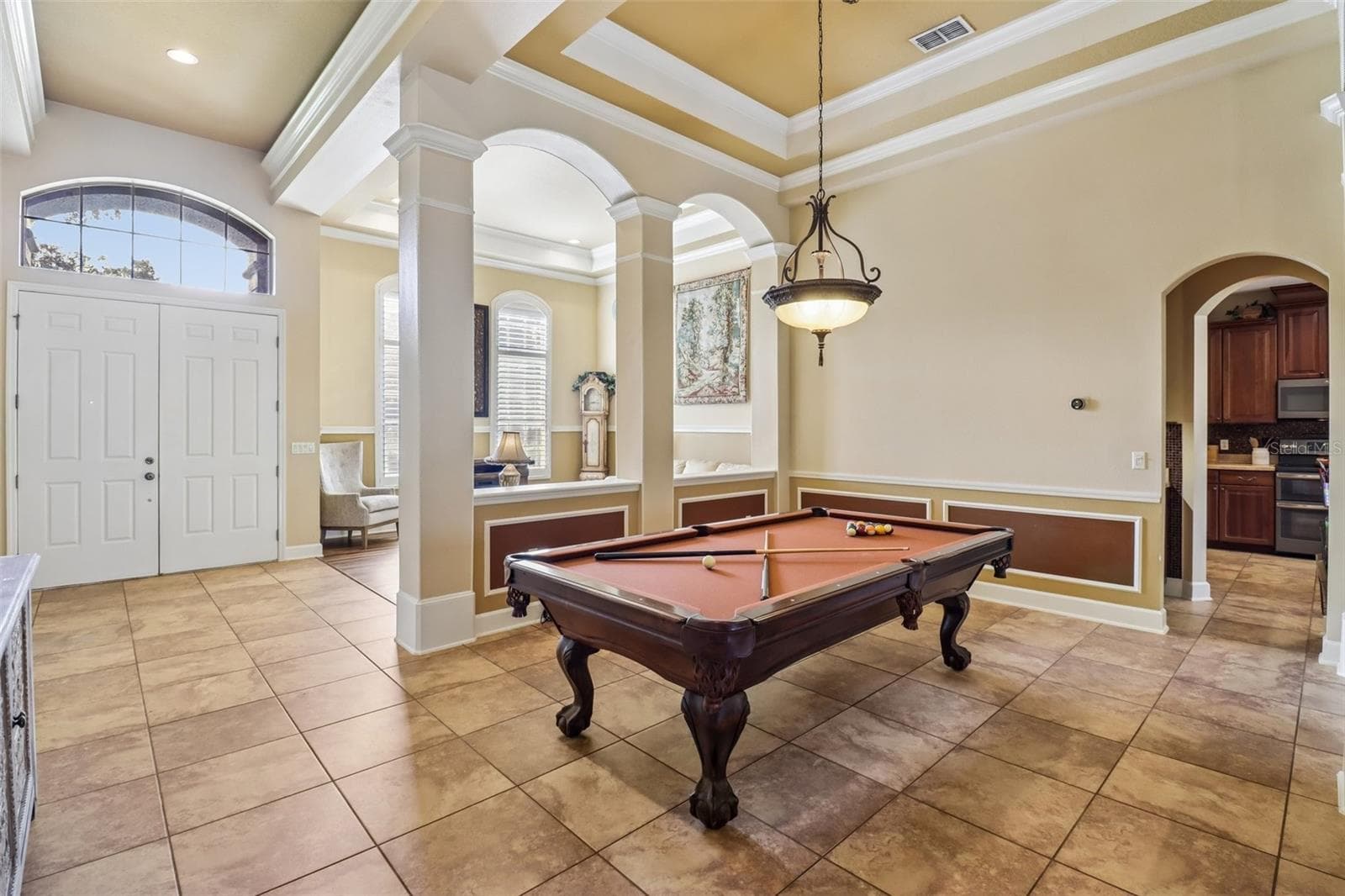 Foyer opens up to formal living and dining spaces that set the tone for this gorgeous home. - 2947 CEDAR CREST DR, APOPKA