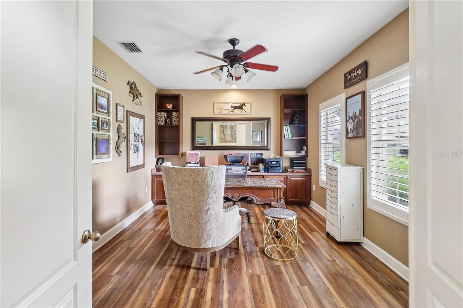 Dedicated home office space complete with custom built-ins. - 2947 CEDAR CREST DR, APOPKA