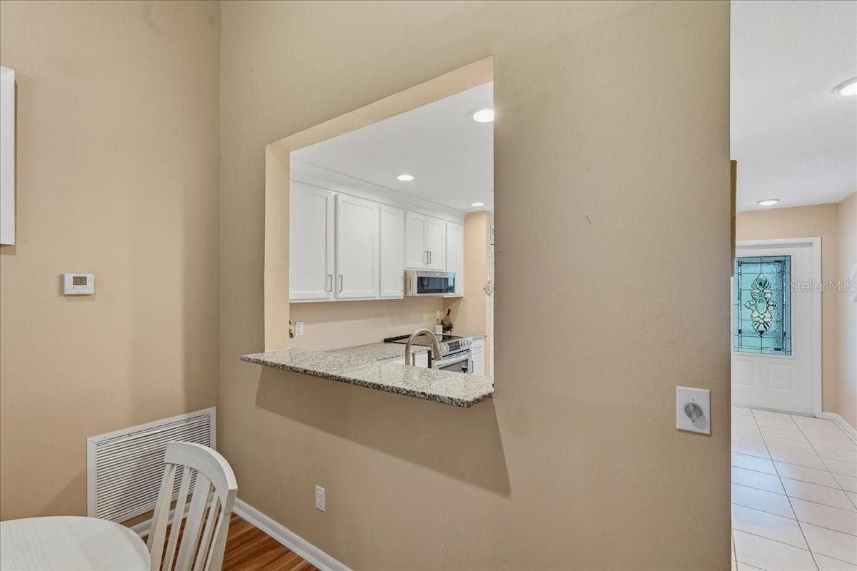 Single Family Residence at 11602 WHITE ASH DR, NEW PORT RICHEY, photo 9 of 58