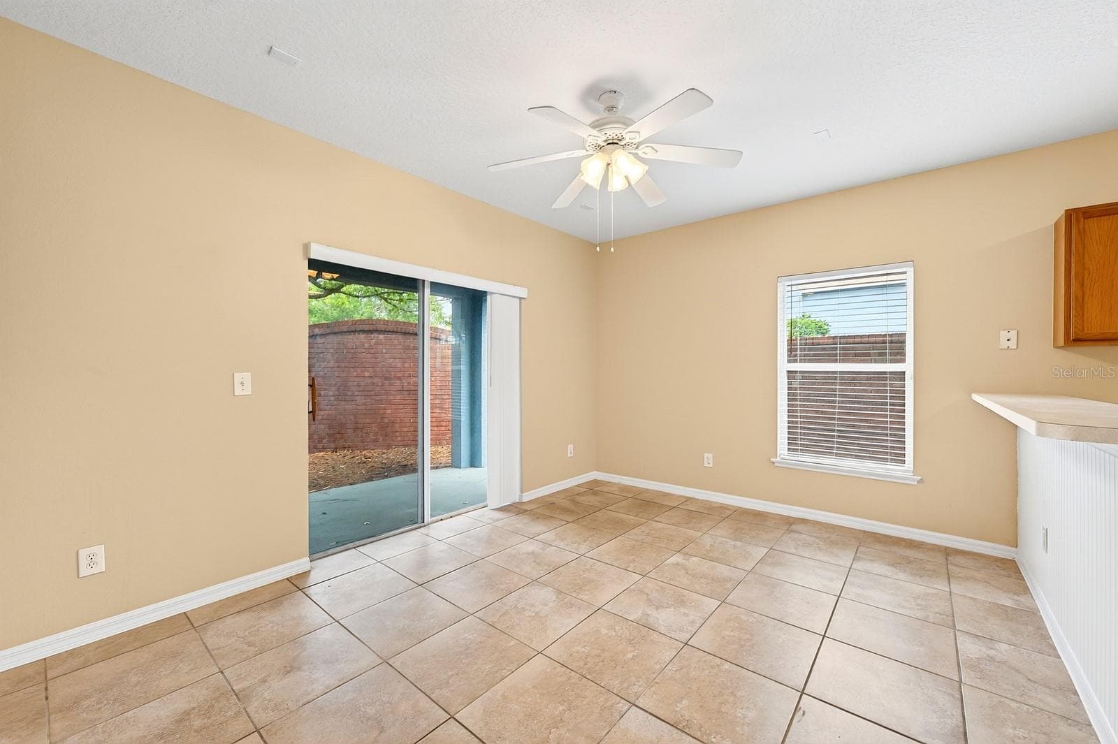 Family room open to the kitchen. - 102 WILTON CIR, SANFORD