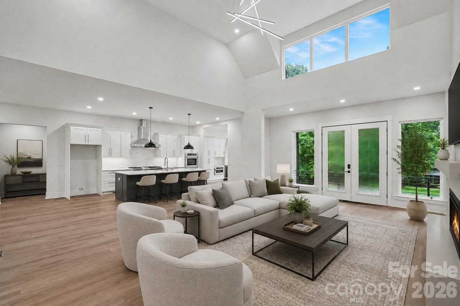 Living room into kitchen-virtually staged - 4808 Rockwood Drive, Waxhaw