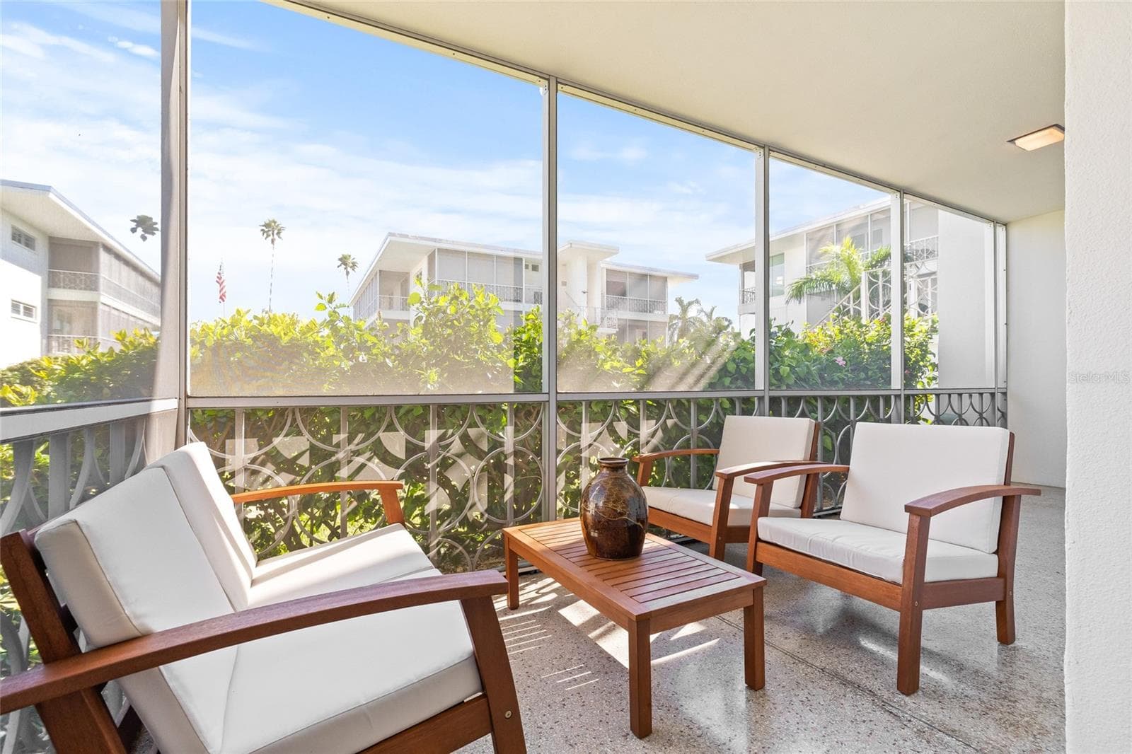 There is access through 3 sliding doors to the patio. - 1012 N SHORE DR NE #14, ST PETERSBURG