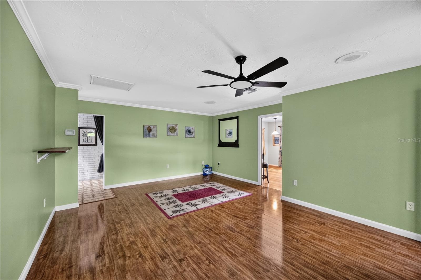 Formal dining room with access to the kitchen. - 1305 GREENFIELD CIR, VENICE